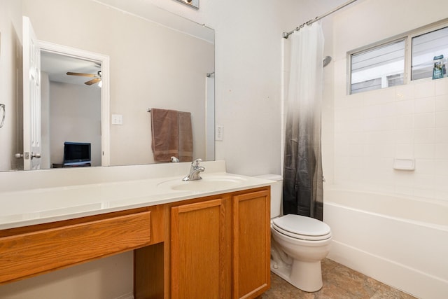 full bathroom featuring shower / bath combo with shower curtain, toilet, ceiling fan, and vanity