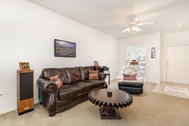 living room featuring ceiling fan and light colored carpet