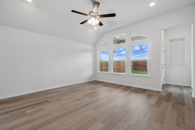 16213 Hidden Cove Dr, Celina, TX 75009 - unfurnished room featuring baseboards, ceiling fan, wood finished floors, and lofted ceiling