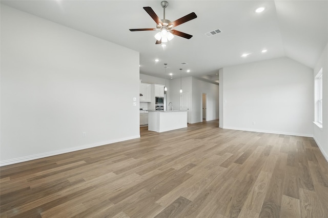 16213 Hidden Cove Dr, Celina, TX 75009 - unfurnished living room featuring visible vents, recessed lighting, light wood-style flooring, and ceiling fan