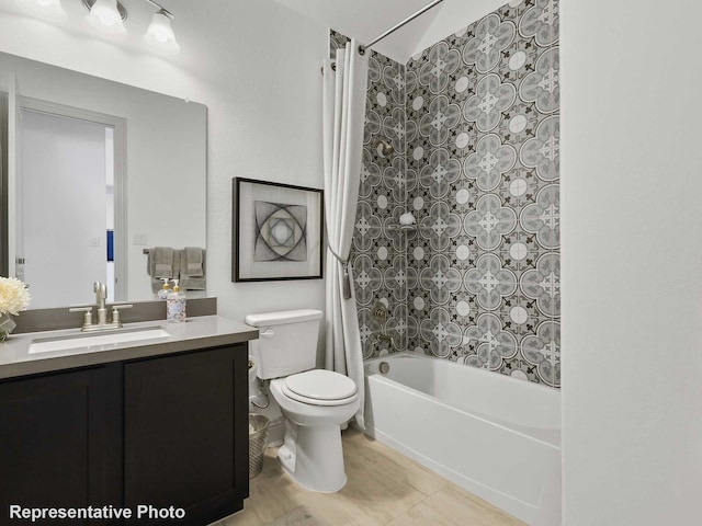 full bathroom featuring vanity, toilet, and shower / bath combo with shower curtain