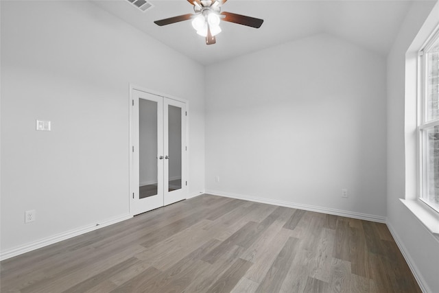 16213 Hidden Cove Dr, Celina, TX 75009 - unfurnished room with a healthy amount of sunlight, a ceiling fan, french doors, and wood finished floors