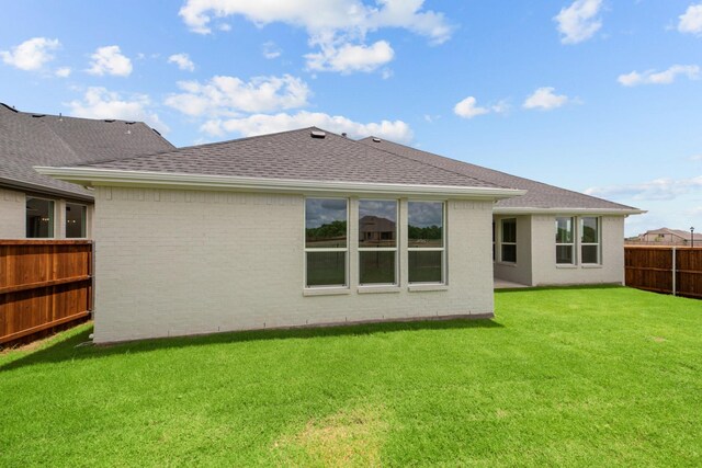 11545 Wulstone Rd, Fort Worth, TX 76052 - rear view of property featuring a shingled roof and brick siding