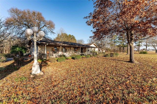 exterior space featuring covered porch