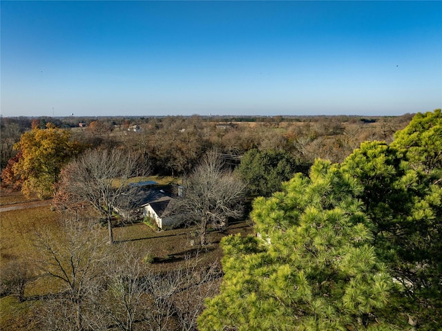 birds eye view of property featuring a rural view