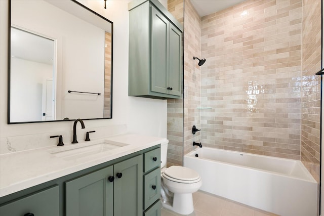 full bathroom featuring vanity, tile patterned floors, tiled shower / bath combo, and toilet