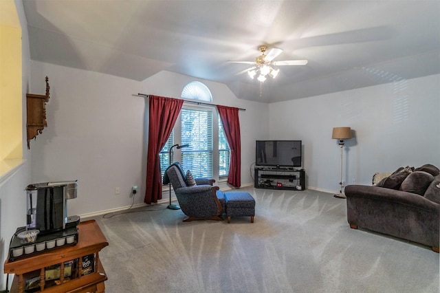 carpeted living room with ceiling fan