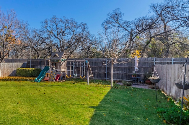 view of yard with a playground