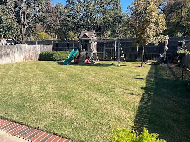 view of yard with a playground