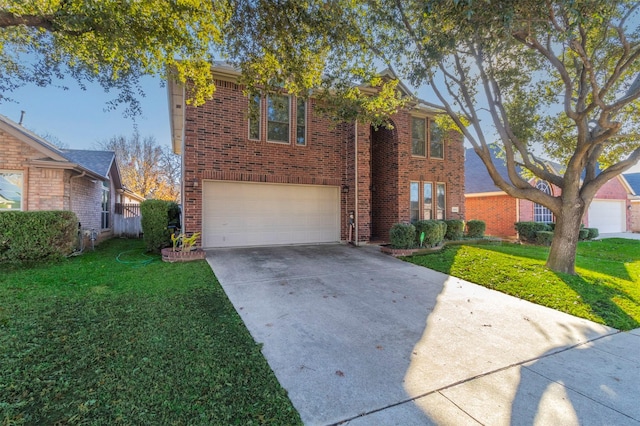 view of front of house featuring a front lawn and a garage