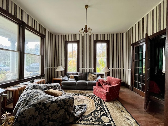 sunroom with a chandelier