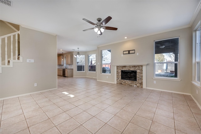 unfurnished living room featuring a stone fireplace, crown molding, and light tile patterned flooring