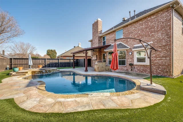 view of swimming pool featuring an in ground hot tub and a patio