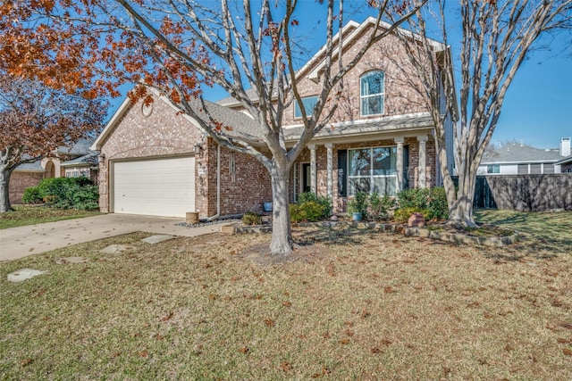 view of front property featuring a garage and a front lawn