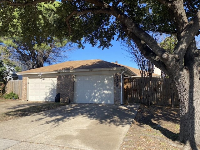 view of property exterior with a garage