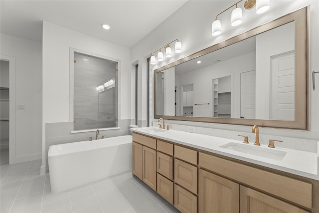 bathroom with vanity, separate shower and tub, and tile patterned flooring