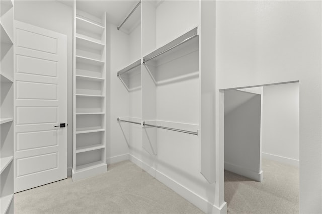 2671 Pelican Pt, Prosper, TX 75078 - spacious closet featuring carpet floors