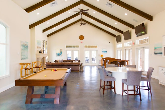 game room with french doors, high vaulted ceiling, and a wealth of natural light