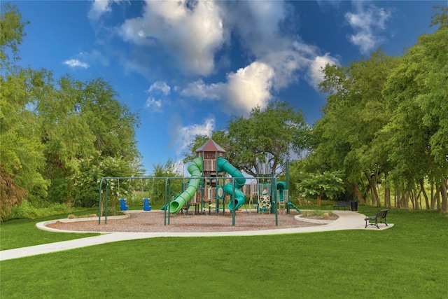 view of playground with a lawn