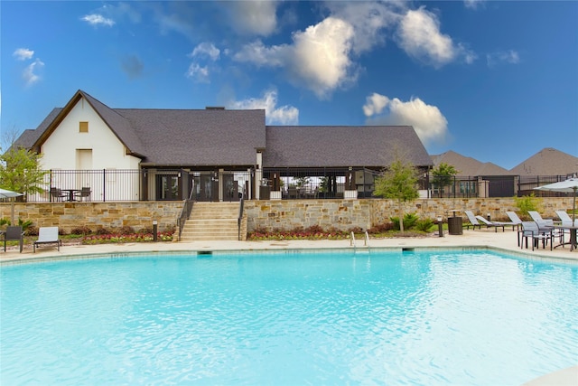 view of pool featuring a patio