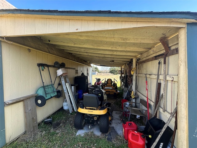 exterior space with a carport