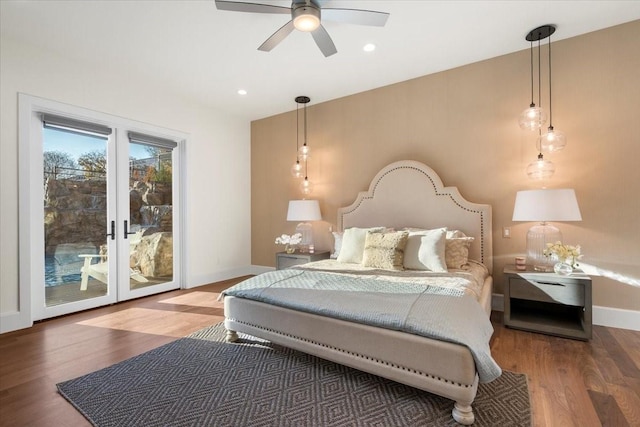 bedroom featuring access to exterior, hardwood / wood-style flooring, and ceiling fan