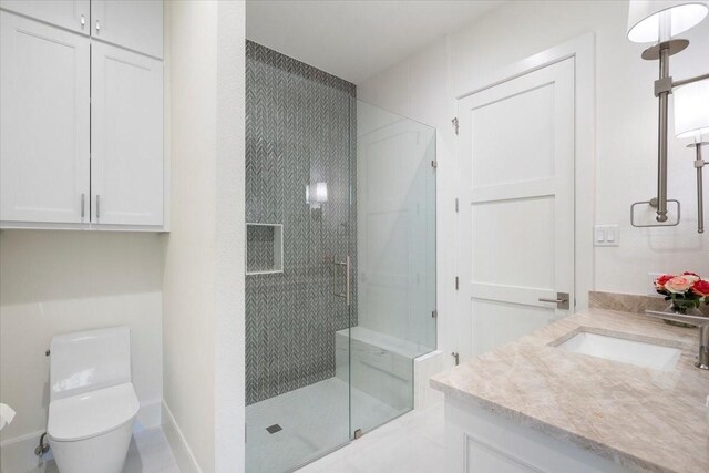 bathroom featuring tile patterned floors, toilet, an enclosed shower, and vanity