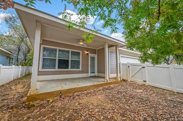 rear view of property with a patio