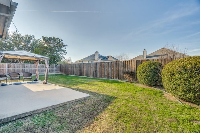 view of yard featuring a gazebo and a patio