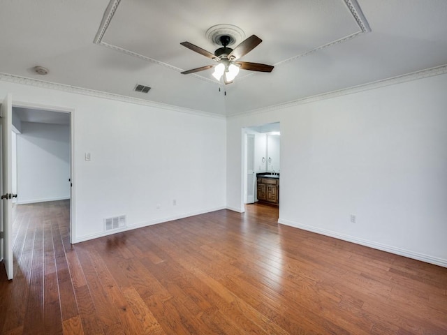 unfurnished room with hardwood / wood-style floors, ceiling fan, and ornamental molding