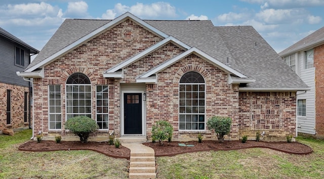 view of front of home with a front yard