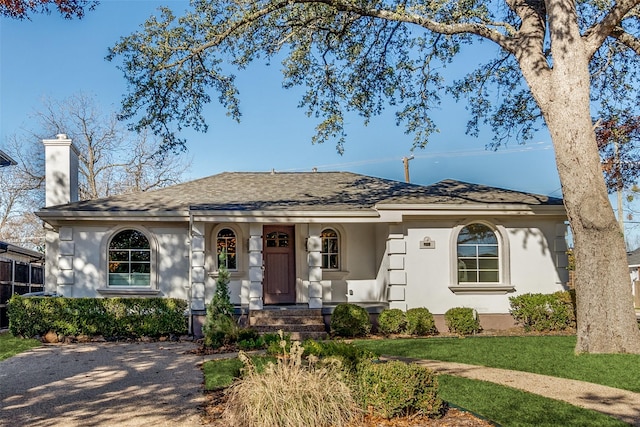 ranch-style home with a front yard