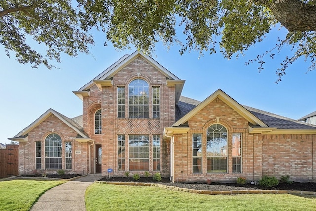 front facade with a front lawn