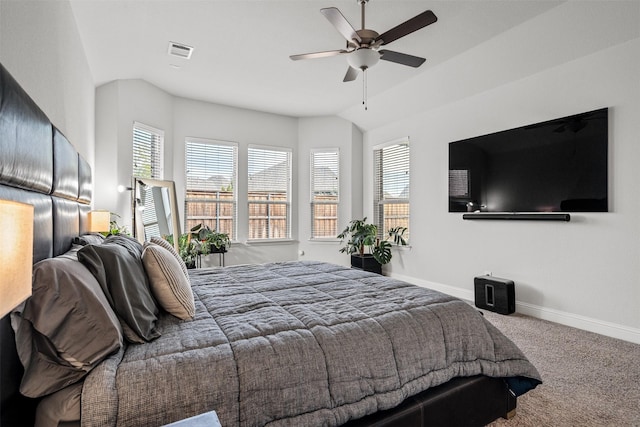 bedroom with carpet flooring, ceiling fan, and vaulted ceiling