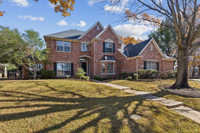 front of property featuring a front lawn