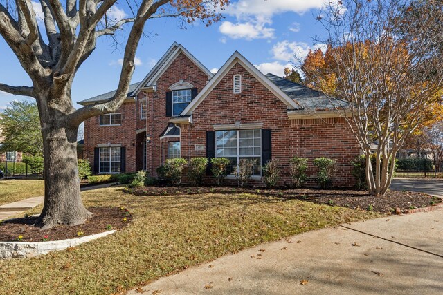 view of property with a front yard