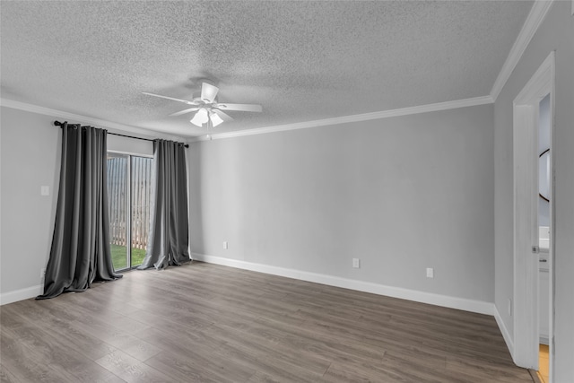 spare room with ceiling fan, crown molding, wood-type flooring, and a textured ceiling