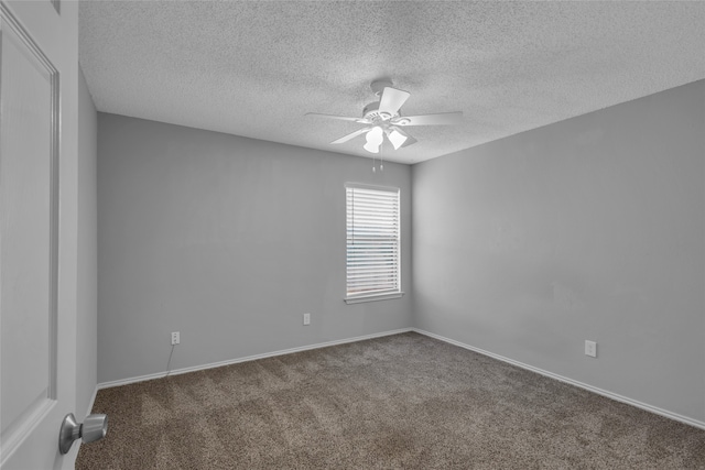 carpeted empty room featuring a textured ceiling and ceiling fan