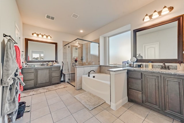 bathroom featuring vanity, separate shower and tub, and tile patterned flooring