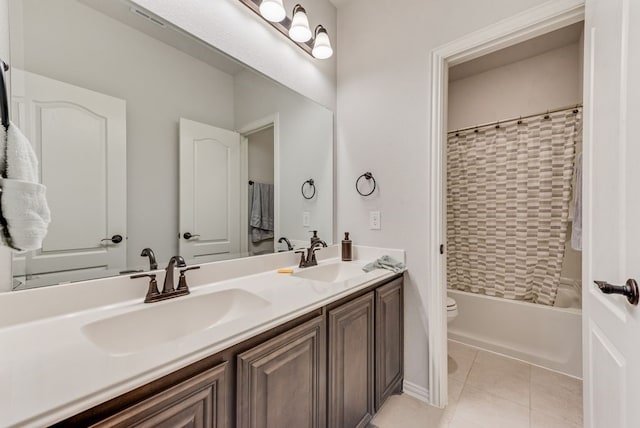 full bathroom with tile patterned flooring, vanity, shower / bath combination with curtain, and toilet