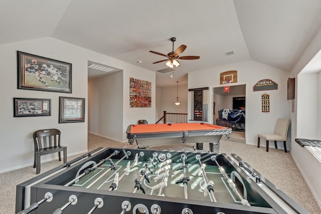 recreation room with lofted ceiling, ceiling fan, and carpet