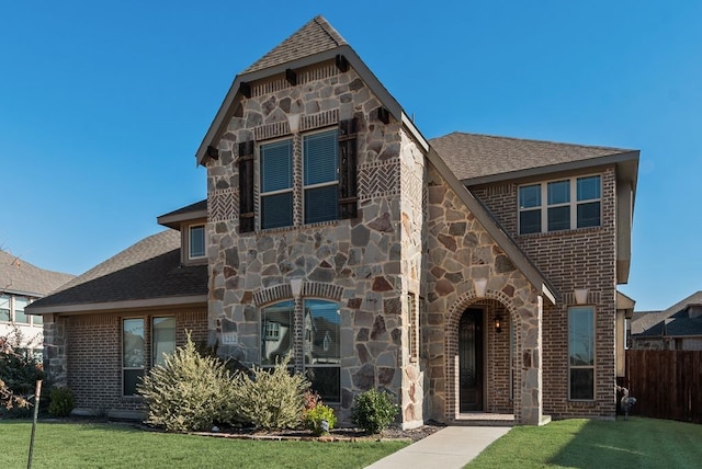 view of front of house with a front lawn