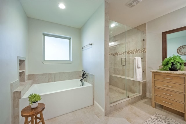 bathroom featuring independent shower and bath and tile patterned floors