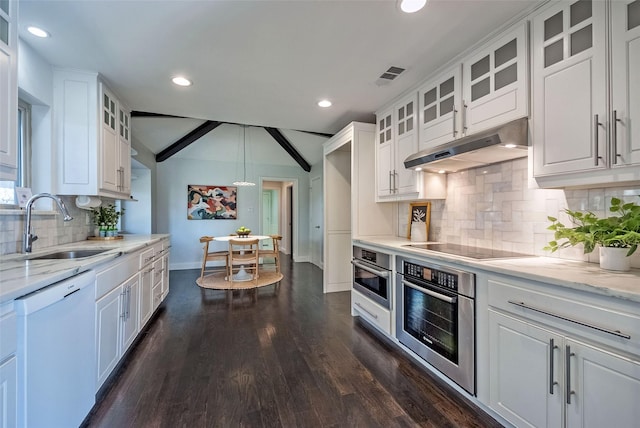 kitchen featuring white cabinetry, dishwasher, and oven