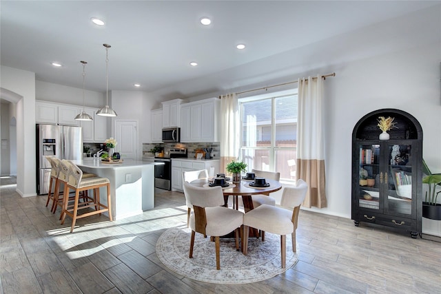 dining room featuring light hardwood / wood-style floors