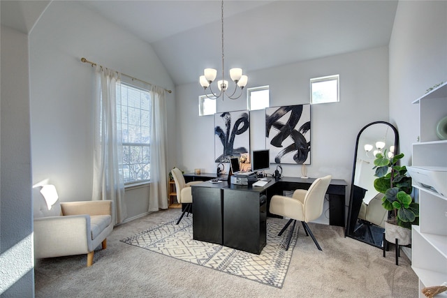 office featuring a chandelier, light colored carpet, a wealth of natural light, and vaulted ceiling