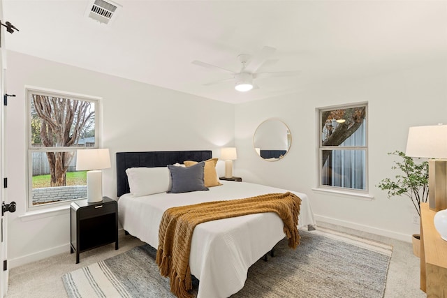 carpeted bedroom featuring ceiling fan