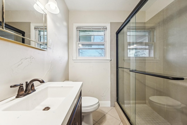 bathroom with walk in shower, tile patterned flooring, vanity, and toilet