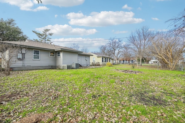 view of yard featuring central air condition unit