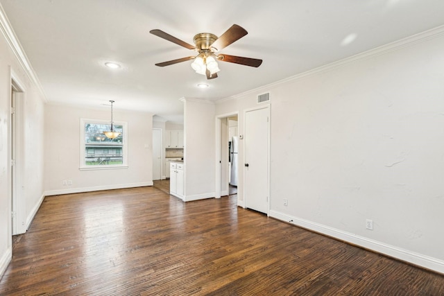 unfurnished living room with ceiling fan, dark hardwood / wood-style flooring, and crown molding